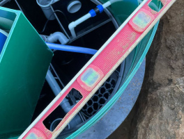 Септик под ключ — выравнивание и утрамбовка грунта после монтажа